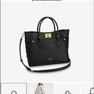 Black Louis Vuitton purse with bandeau.